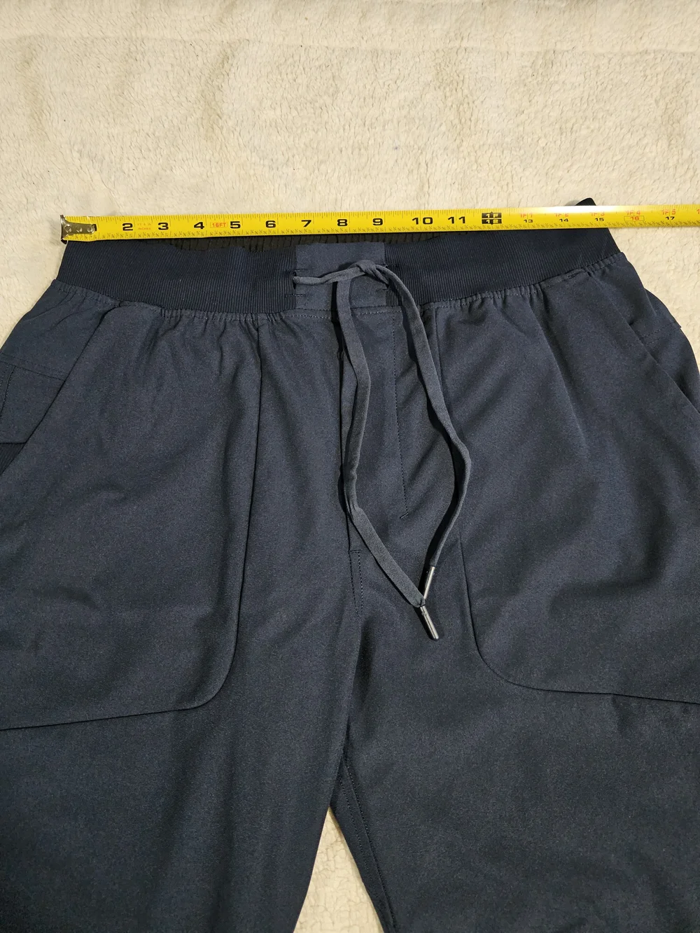 LULULEMON ABC Tapered Recycled-Warpstreme Drawstring Trousers.